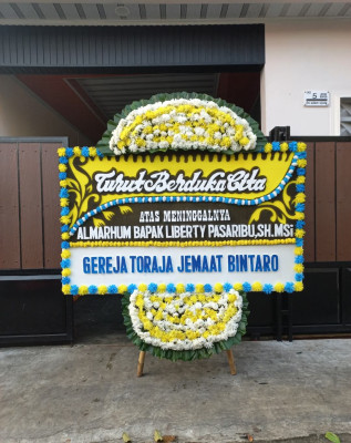 Papan Bunga Duka di Mndona Hiera